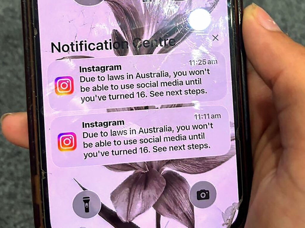 Australia’s social media ban for young people takes effect | Social Media News AFP 20251209 87J23JP v1 HighRes AustraliaInternetBan 1765308551.jpg