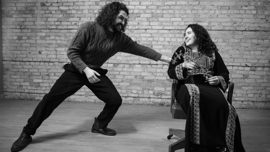 Q&A with William Nour, playwright of ‘Rosette’ 16b423 20240919 Two People Interact On Stage In A Black And White Photo 2000.jpg