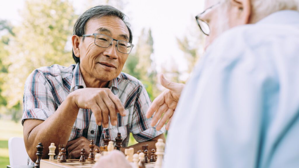 Three Research Topics exploring dementia diagnosis and treatment Horizontal Group Of Senior Friends Playing Chess Game At The Park. Lifestyle Concepts About Seniorit.jpeg