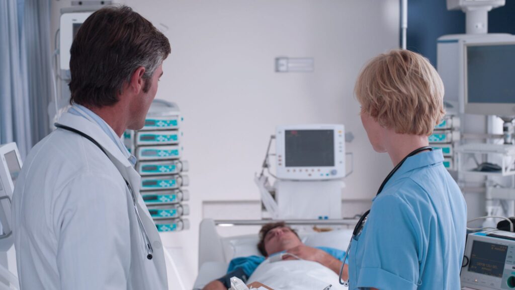Cropped Doctor Nurse Talking Icu 170749351.jpg