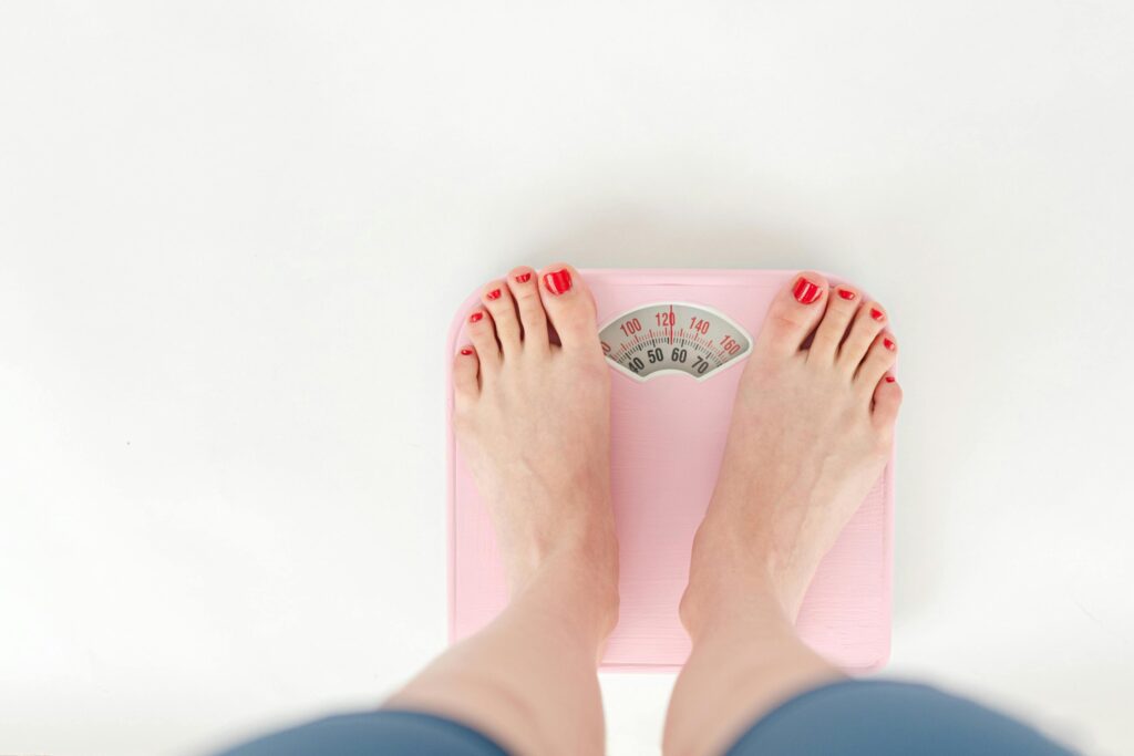 What is ‘health at every size’ lifestyle counseling? How does it compare with weight-focused treatments? Standing On A Scale.jpg