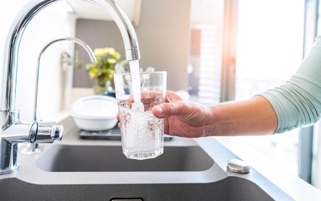 Woman Filling Tap Water.jpg