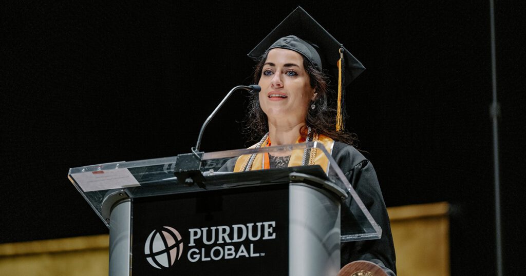 Transforming communities through nutrition, education and well-being 24pgcommencement Lewisog.jpg