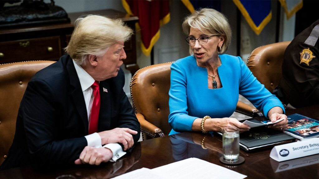 Trump’s former education secretary says she is ‘very open’ to discussion about returning to previous post Devos Trump.jpg