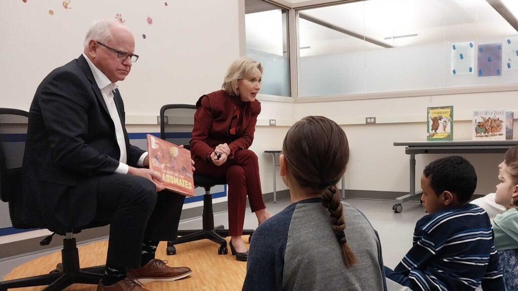Walz warns Department of Education cuts could put students, schools at risk 812464 20250312 two people sit and read to kids 2000.jpg