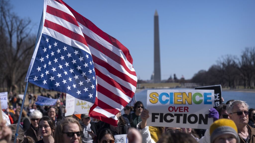 Out of the lab and into the streets, researchers and doctors rally for science against Trump cuts Urlhttps3a2f2fassets.apnews.com2f752f962fd7309620e964bbda996d2b72a4372f8d7cc784121c45cdb42e.jpeg