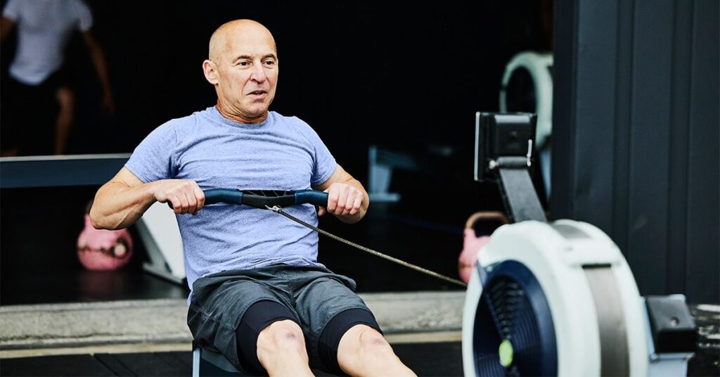 Mature man rowing machine 1200 628 facebook.jpg