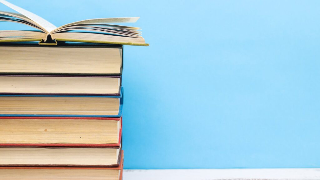 History of tuberculosis topic for inaugural ‘Big Read’ book club Stack of books 2000x1125.jpg