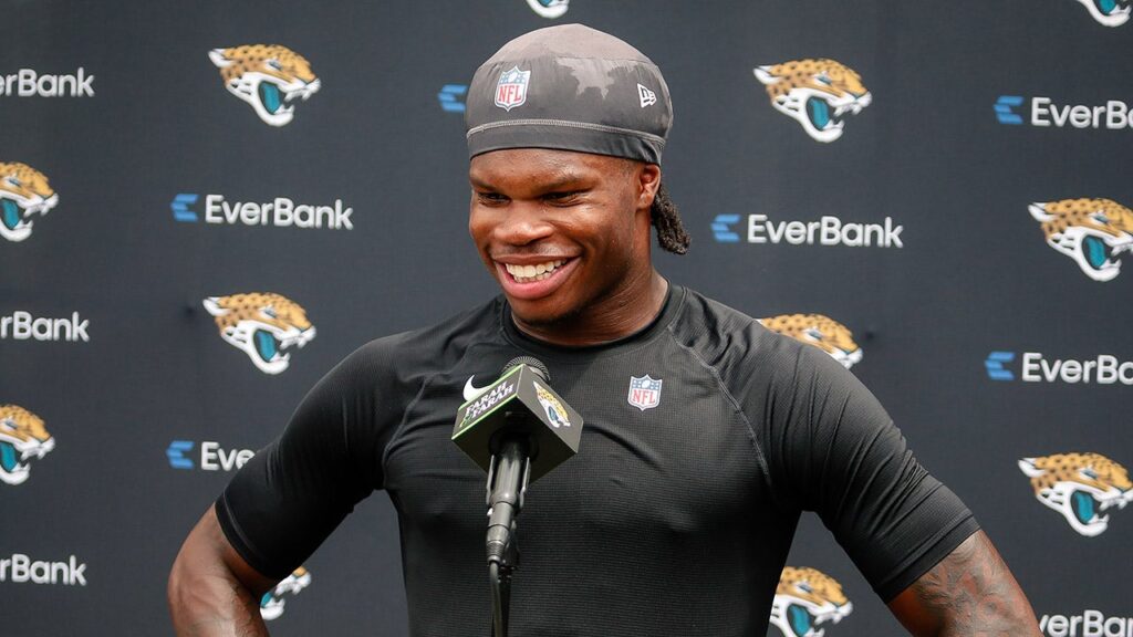 Travis hunter presser.jpg