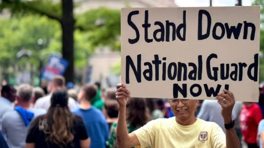 Immigration protests shadow Trump’s $45M military parade through Washington, DC Immigration protest dc.jpg
