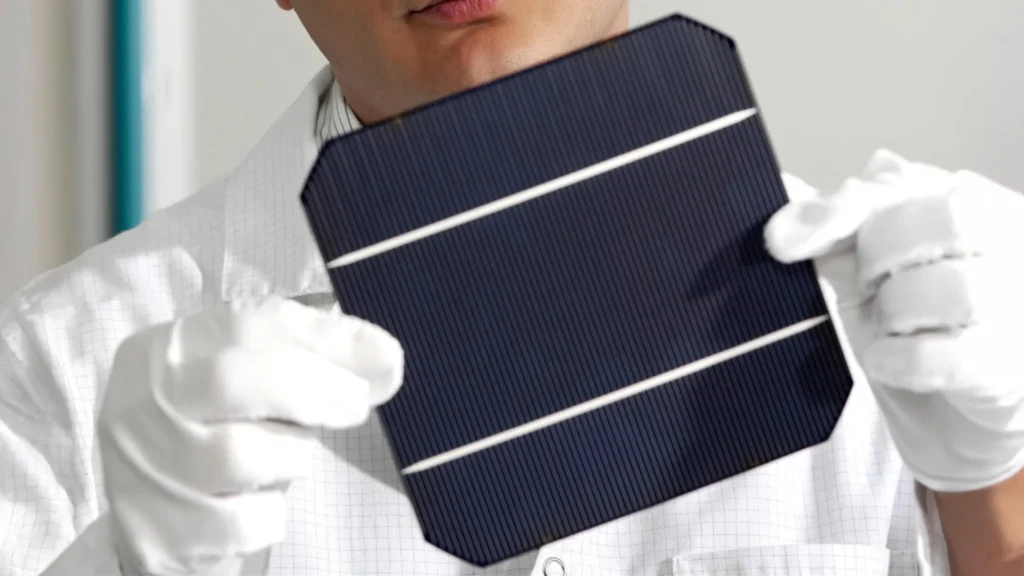 New Nanotech Boosts Solar Cell Efficiency Over 10% Inspecting new solar cell.webp.webp