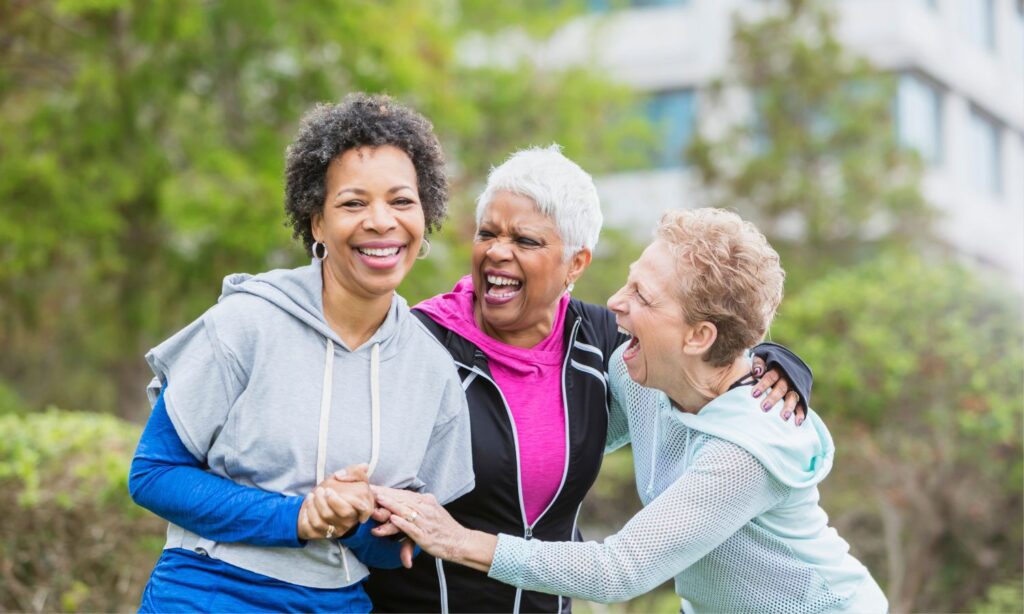 Three friends walking socializing image by canva.jpg