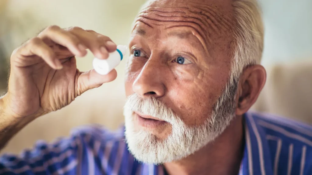 Senior man eye drops.webp.webp