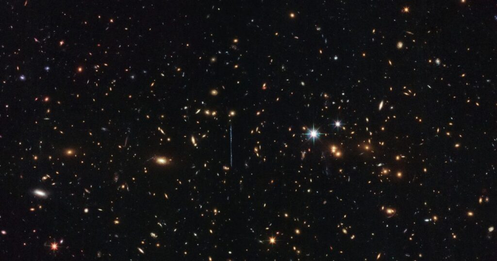 Where does the expanding Universe begin? 2560px a gargantuan collision act cl j0102 4915 e1761517369840.jpg
