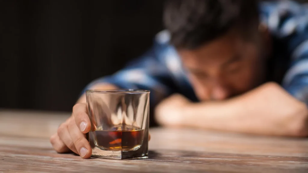 Alcoholism alcohol addiction whiskey glass.webp.webp