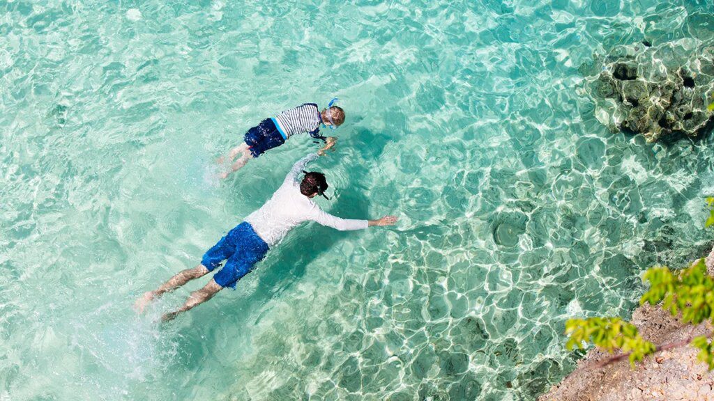 Anguilla named safest Caribbean destination in new 2025 ranking Father son snorkeling anguilla caribbean.jpg