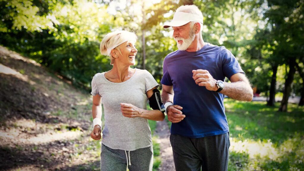 Lifestyle changes may help prevent Parkinson’s disease, experts say Older couple jogging outside parkinsons risk.jpg