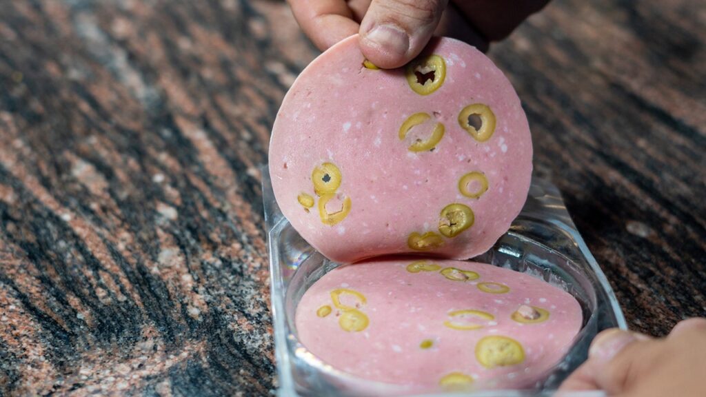 Olive loaf package hands.jpg