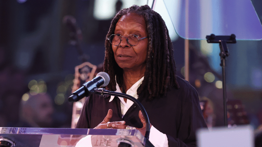 Whoopi goldberg speaks at event.png
