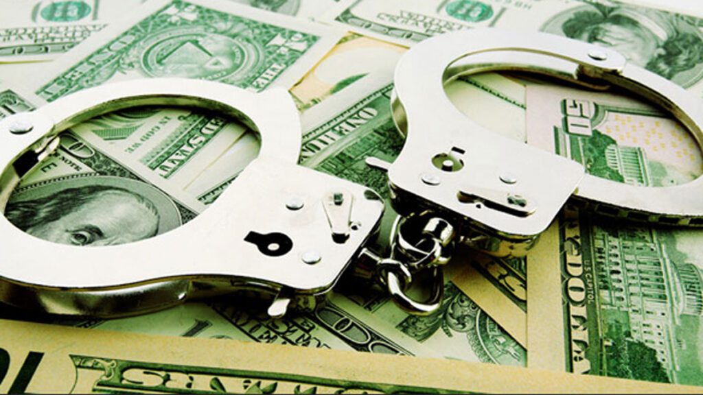 Money handcuffs generic nbc.jpg